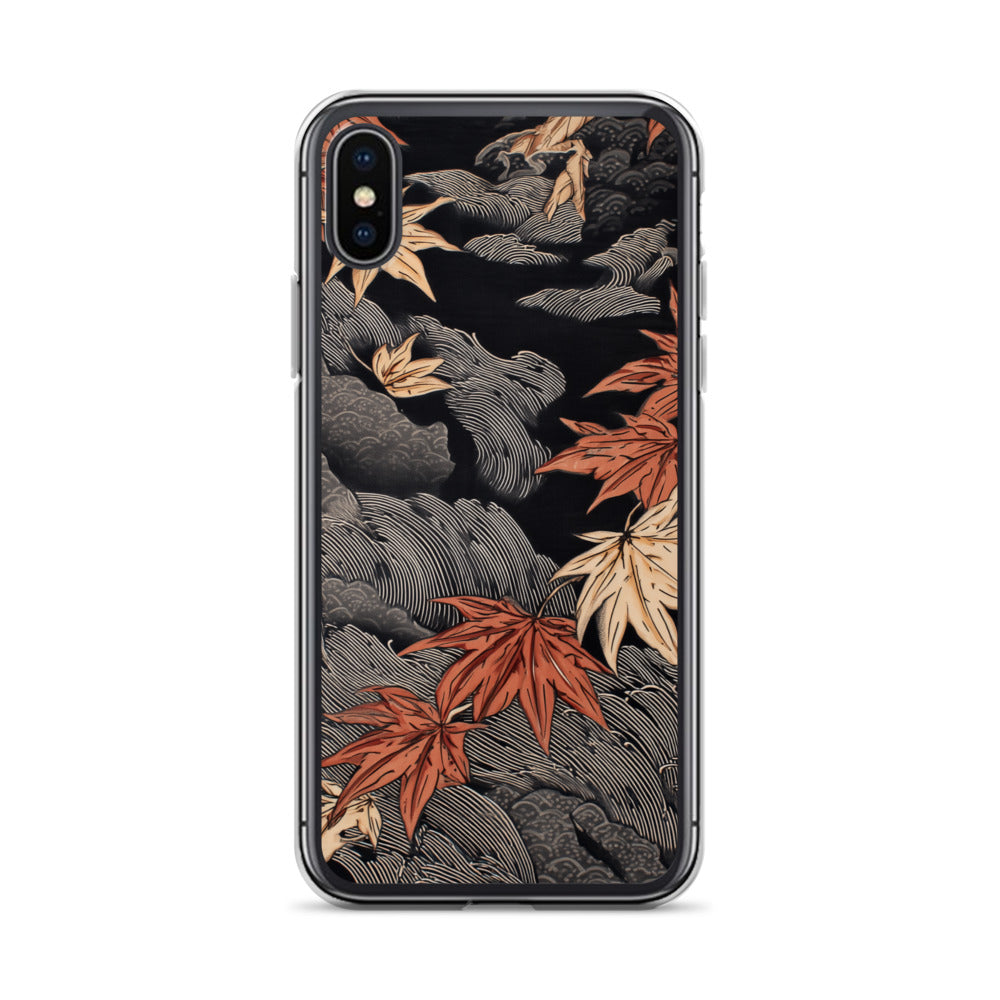 Clear iPhone case: Red and ochre maple leaves stretch across layered rocks and dark flowing water.