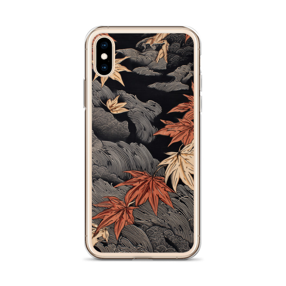 Clear iPhone case: Red and ochre maple leaves stretch across layered rocks and dark flowing water.