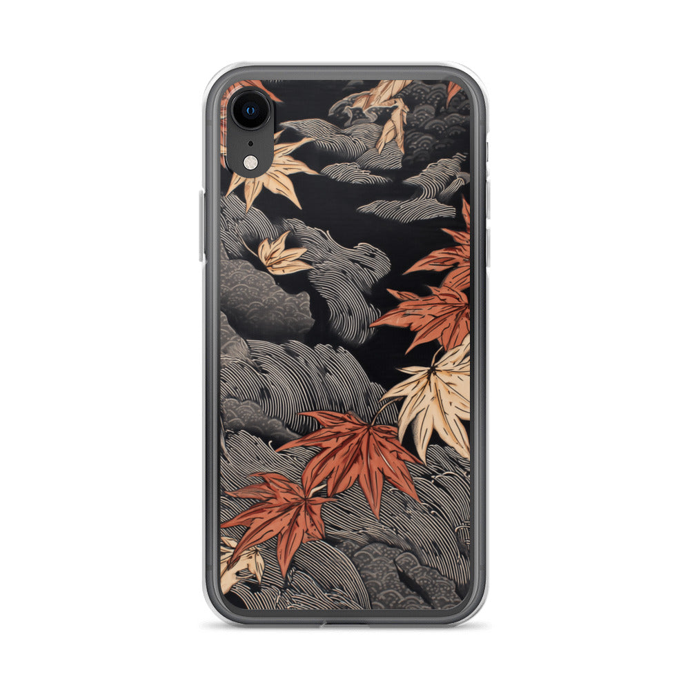Clear iPhone case: Red and ochre maple leaves stretch across layered rocks and dark flowing water.