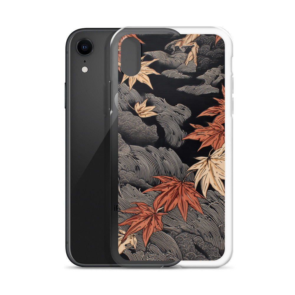 Clear iPhone case: Red and ochre maple leaves stretch across layered rocks and dark flowing water.
