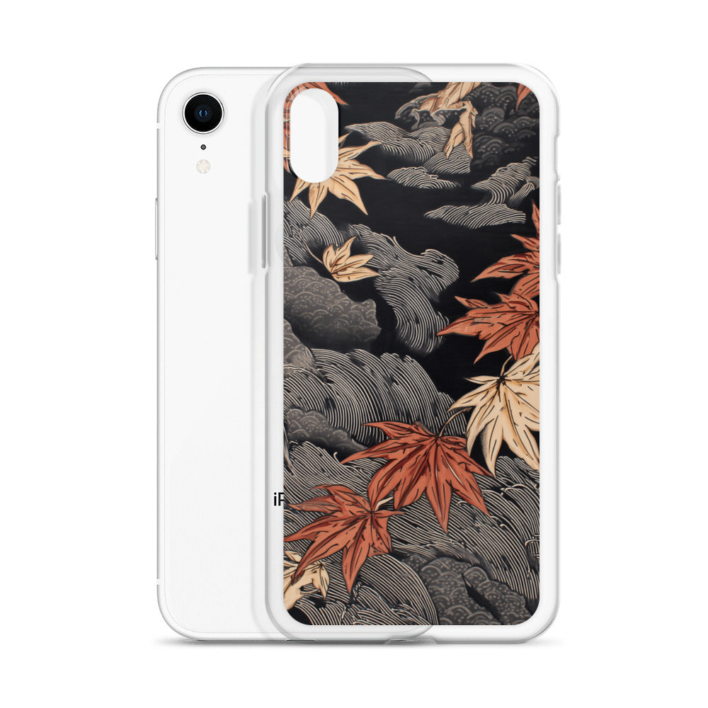 Clear iPhone case: Red and ochre maple leaves stretch across layered rocks and dark flowing water.