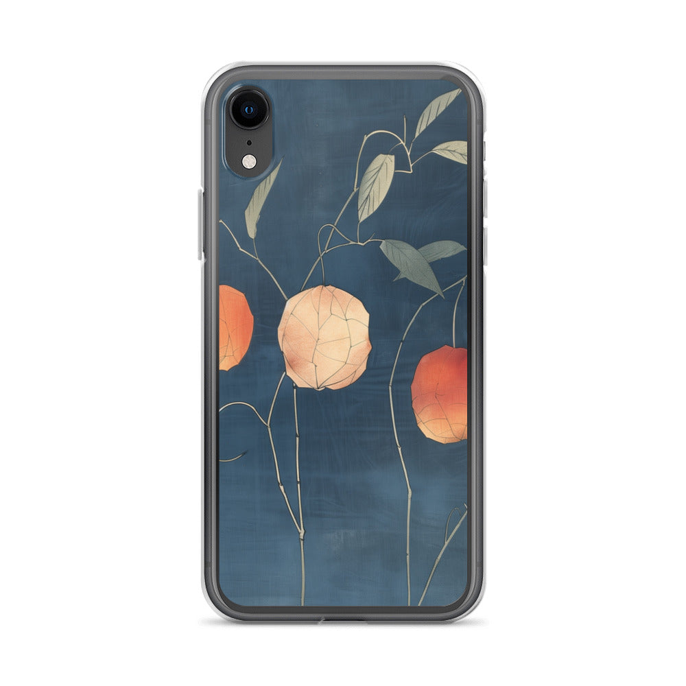 Clear iPhone case: Orange and pale ground cherries hang from slender stems against a deep blue background.
